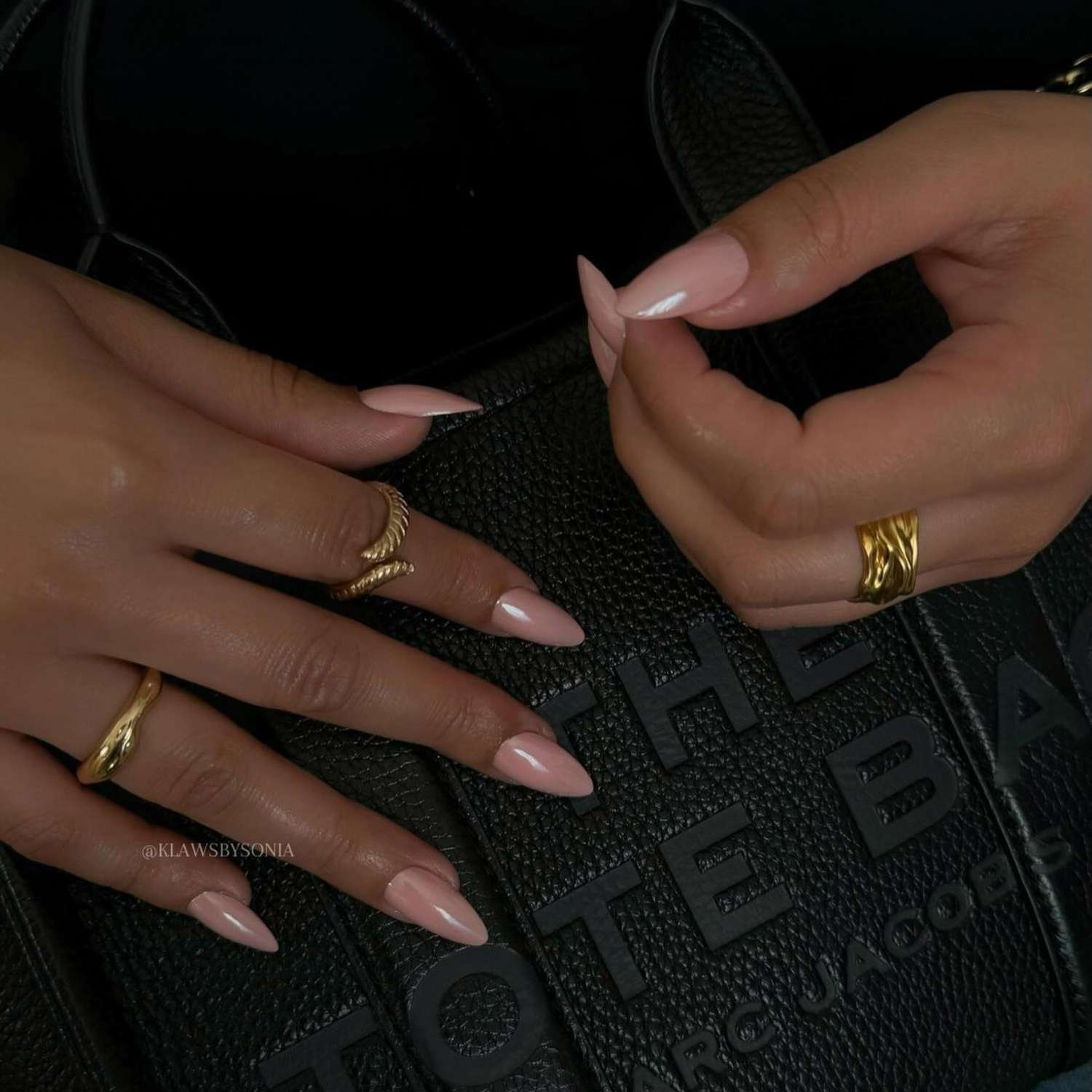 close up of nails with visible radiation pink chrome manicure
