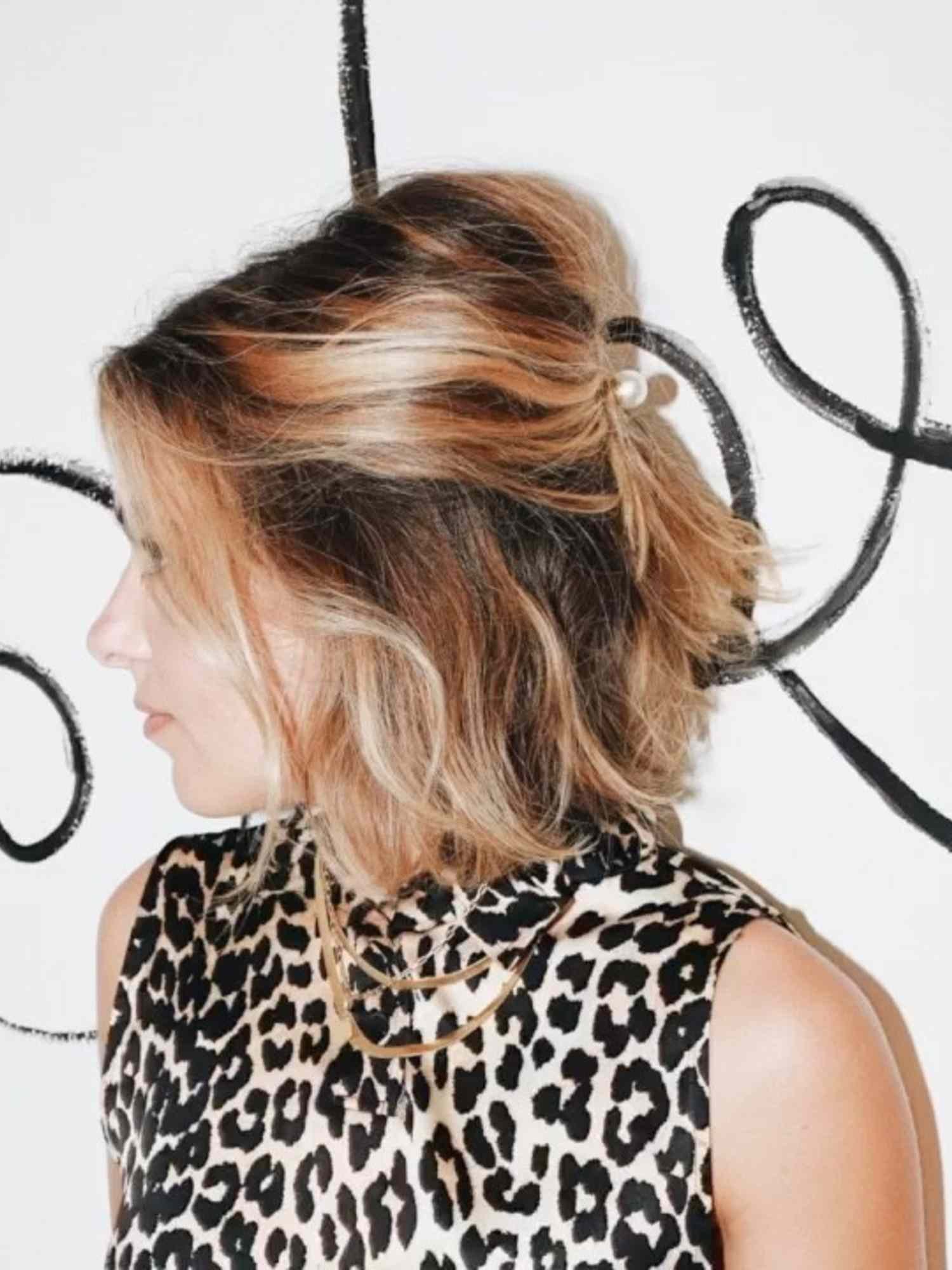 Effortlessly chichi Half-Up French girl roll - InStyle Bobby pin Hairstyles