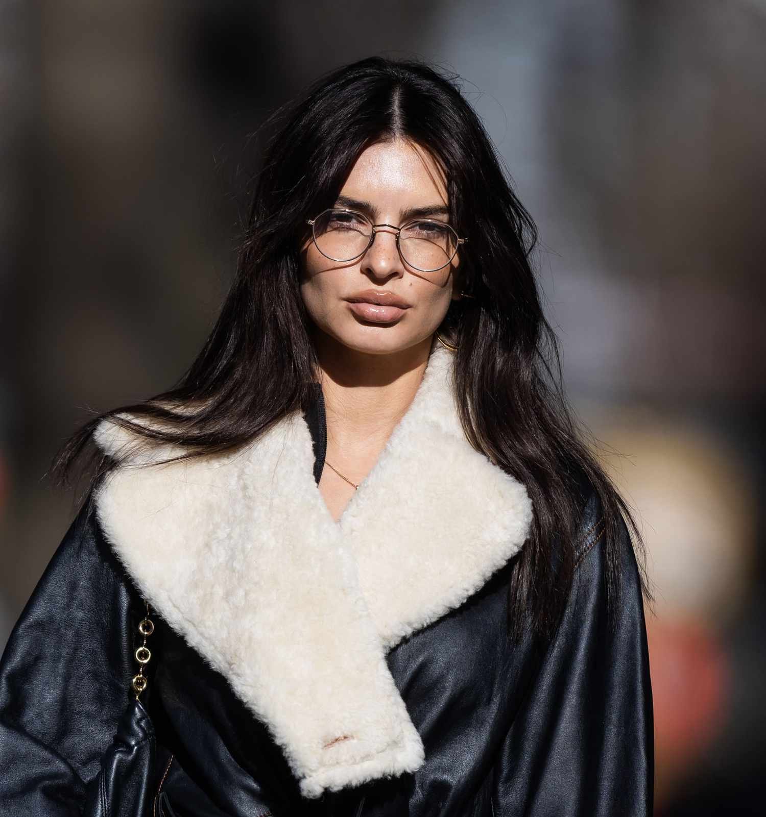 Emily Ratajkowski wearing glasses.