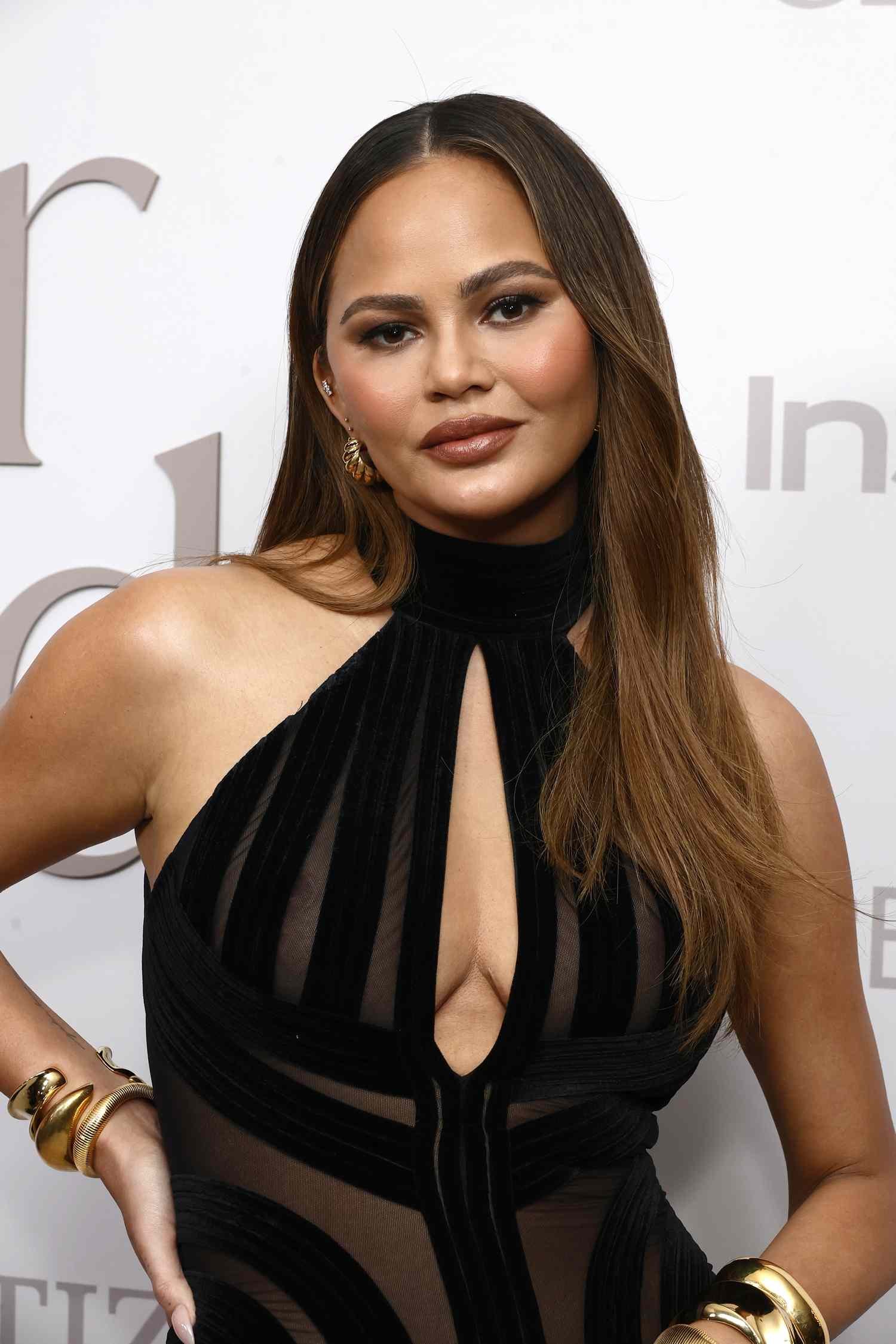Chrissy Teigen wearing blush.