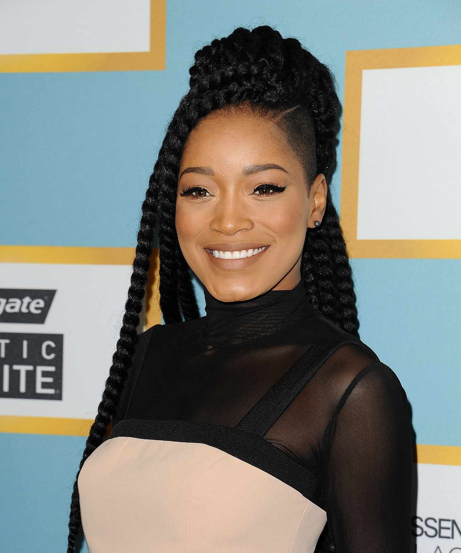 Half Up, Half down feather hairdo for Black Hair