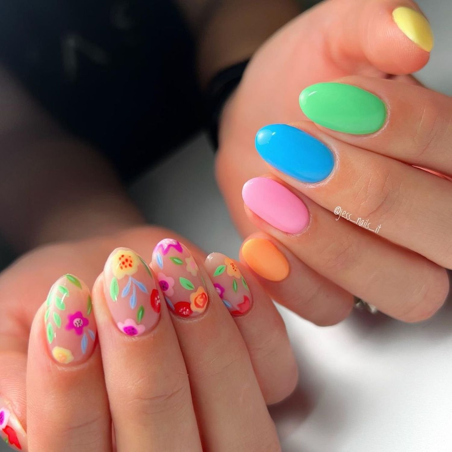 Pastel Ne floral manicure next to a manus with solid-colored nails