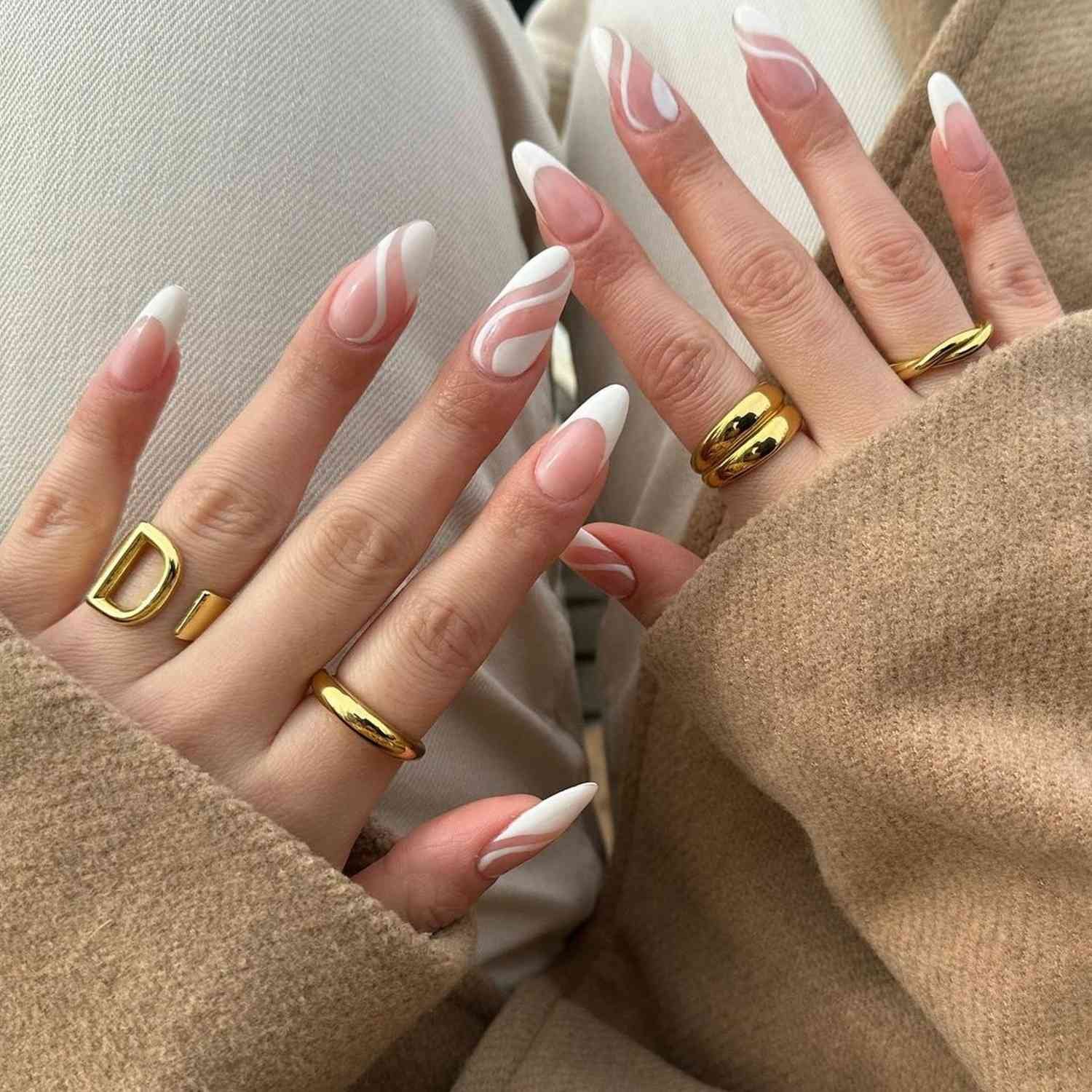 Classic white convolution nail design showcasing angstrom neutral, negative space base