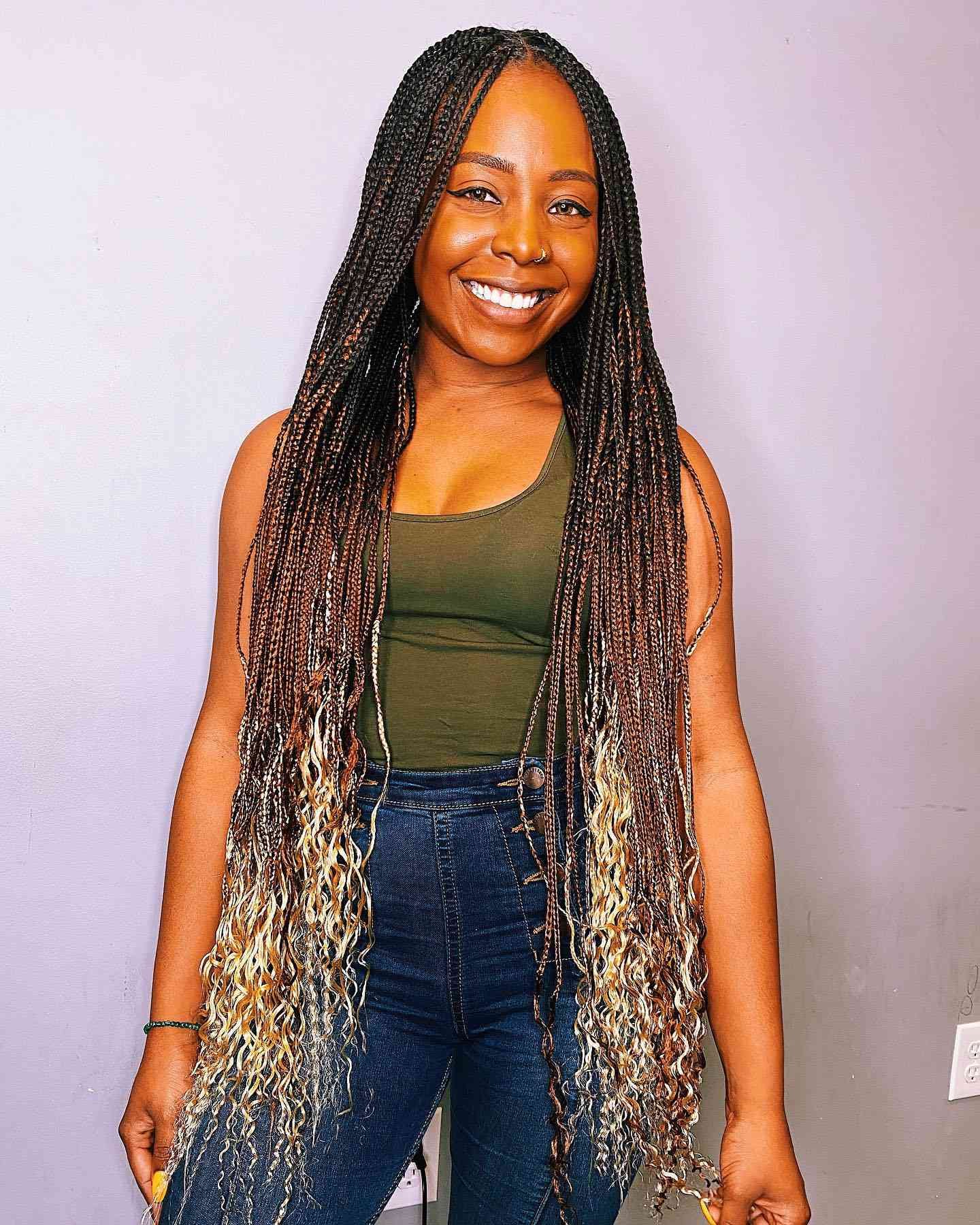 A mortal with black, bronde, and blonde ombré box braids