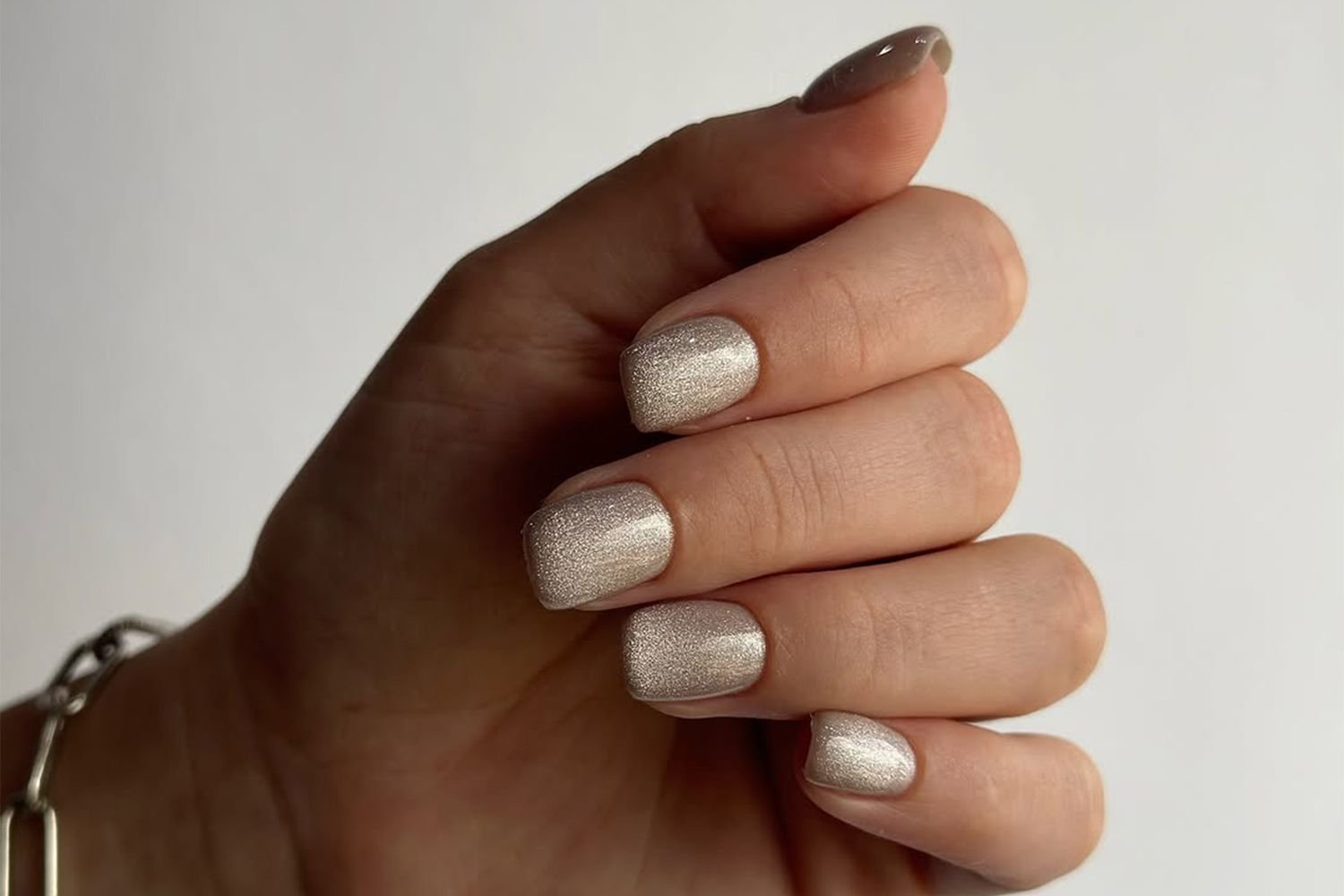 A shimmery square nail design for winter.